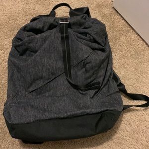 Lulu lemon backpack. Never used. Grey design with lots and lots of pockets!